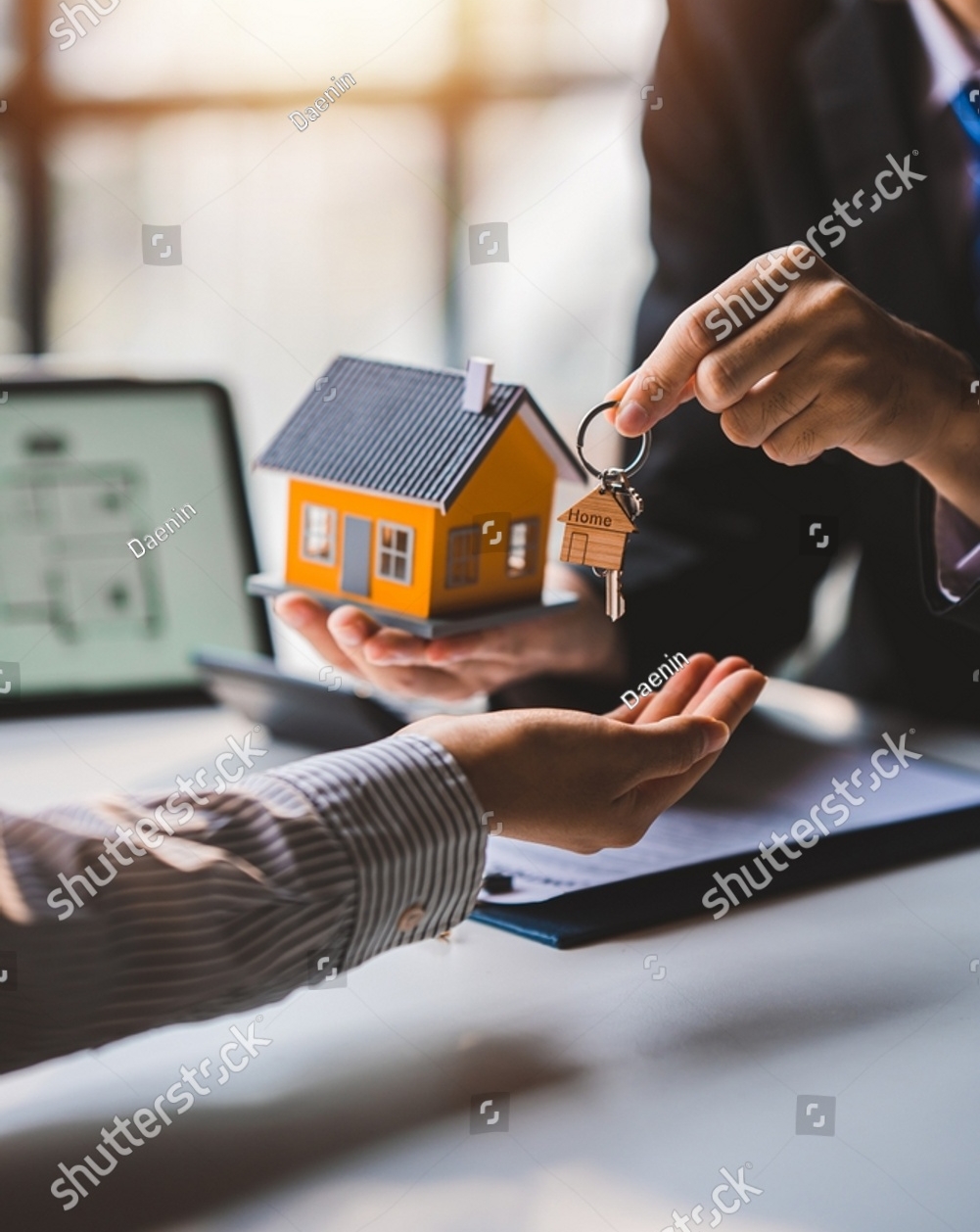 stock-photo-real-estate-agent-delivering-sample-homes-to-customers-mortgage-loan-contracts-make-a-contract-2223677649